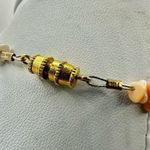 Puka orange shell necklace Photo 6