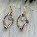 Twisted gold tone dangle faceted rhinestones earrings Photo 2