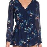 Japna NWOT Revolve  Blue Floral splice ruffle hem Romper. Size Small Photo 3