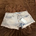 Revice Denim NWT- Low rise mini shorts from  Photo 3