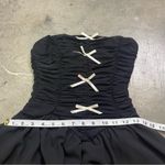 Windsor  Y2K Elegant Black Strapless Dress with Bow Accents Photo 5