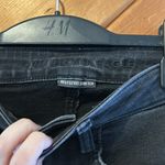 American Eagle super high-rise black jeggings distressed knee skinny jeans Photo 6