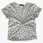 Brandy Melville  White with Black Flowers Short Sleeve Top Photo 0