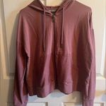 cute zip up hoodie. Great condition. Barely worn. Size small Photo 0
