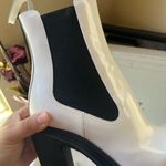 Alexander McQueen ❤️ tread heeled Chelsea boot in ivory/black Photo 9