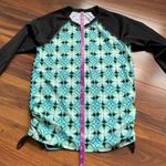 Title Nine  Rash Guard Side Scrunch Tie Black and Blue Two Sided Geometric Shapes Photo 7