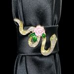 “Dainty Dapper” Black necktie Necklace with Gold and Pink Accent serpent pin. Photo 1