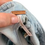 Free People  Chambray Fringe Hem Pleated Jean Shorts Photo 1