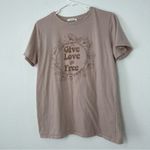 Tres Bien  Give Love Free Pink Graphic Scooped Neck Short Sleeve Tee Medium Photo 1