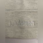 Lululemon  NWT Warm Revelation Beanie Merino Wool Blend Heathered Bone Color Photo 9