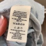 Free People  Chambray Fringe Hem Pleated Jean Shorts Photo 2