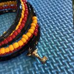 Disney ’s Mickey Mouse Wrap Around Bracelet with charms Photo 3