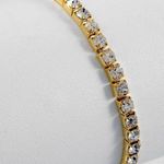 GOLD TONE CLEAR RHINESTONE STRETCH BRACELET Photo 0