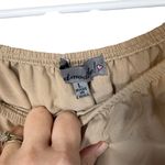 Mad Madele Large cinched waist beige Flowy sleeveless high low dress Gray Photo 1