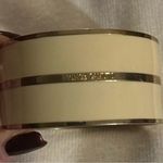 Vince Camuto women’s closed cuff bracelet. Ivory and gold tone. 1-1/4”H 2-1/2”W Photo 0