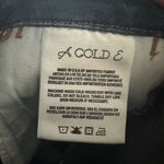 AGOLDE  dark wash distressed stretchy Chloe low rise 24 jeans Photo 4