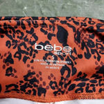 Bebe  Leopard Print Biker Shorts Photo 4