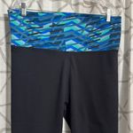 Fabletics Black Leggings with Vibrant Blue Patterned Waistband Photo 1