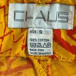 Vintage 80sCosby high waisted, pleated, wideleg abstract pattern cuffed shorts S Orange Photo 5