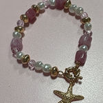 Pink and Gold Beaded Bracelet with Starfish Charm Photo 0