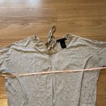 Calvin Klein Jeans  short sleeve top with tie back size medium Photo 2