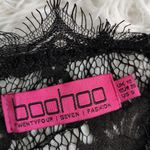Boohoo  lace black mini dress with lace cape size 6 Photo 7