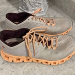 on cloud On Running Cloud Women’s Shoes 7.5 light gray & peach. Good condition small worn spot on heels Photo 0