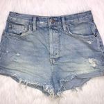 We The Free  Women’s Distressed Raw Hem Light Wash Button-Up Denim Shorts Photo 0