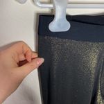 Nike  Pro shimmering metallic gold workout leggings size S Photo 4