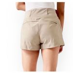 Athleta  Trekkie North Short Size 10 Sand Running Hiking Outdoor Shorts Khaki Photo 1