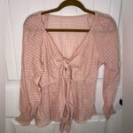 Pink Front tie knot babydoll blouse w/ deep v neck Photo 1