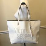 Victoria's Secret VICTORIA SECRET White Tumbled Laser Cut Logo Shoulder Tote Bag w Silver Interior Photo 1
