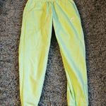 Nike  yellow high rise joggers size small Photo 0