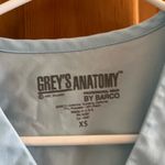 Grey's Anatomy  professional wear scrub top in blue size xsmall Photo 1