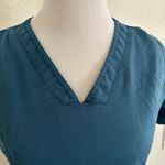 Marilyn Monroe  Teal Short Sleeve V-Neck Top Photo 3