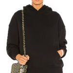 We Wore What Revolve ‎ black hoodie sweatshirt Photo 0