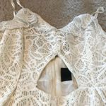 PacSun Cream lace spaghetti strap romper with cut out front never worn Photo 4