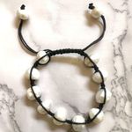 Pearl bracelet on adjustable black silk cord Photo 0