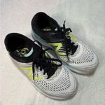 New Balance White and Black Athletic Shoes with Lime Accents Photo 1
