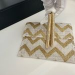 Gold Tone Hoop Earrings with Chevron Pouch Photo 3