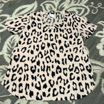 Sew in love cheetah print top. Super soft and stretchy. Like new. Pink Photo 0