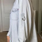 Gloria Vanderbilt Blue and white striped button up shirt with a western vibe and metal grommet Photo 1