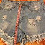 Machine ripped high rise Jean shorts Size 30 Photo 8