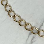 Gold Chain Link Belt with Tassel Charm Photo 1