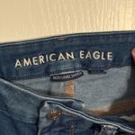 American Eagle Brand: Lucky Brand Style: Bridgette High Rise Skinny Color/Wash: Medium Wash Blue Denim Size: 6/28 Details: Button Fly Closure Stylish and flattering Lucky Brand Bridgette high rise skinny jeans featuring a medium wash and button fly closure. The high rise fit and classic skinny leg make them a versatile wardrobe staple that can be dressed up or down. Condition: Excellent, gently worn. Photo 2