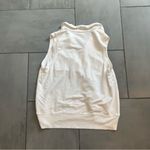 Evereve  White Sleeveless Polo with Beige Striped Details Photo 3