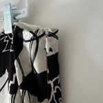 White House | Black Market  Black and White Floral 100% Silk Pleated Knee Skirt Photo 3