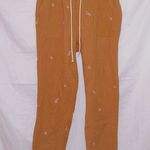 Molly green orange high waisted pull on floral print gauze skinny leg pants Photo 0