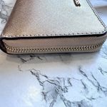 Michael Kors Jet Set Travel Metallic Leather Smartphone Wristlet in Pale Gold Photo 5