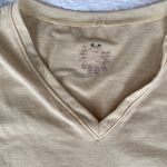 Under Armour women L heatgear v-neck sleeveless workout top gold Photo 1